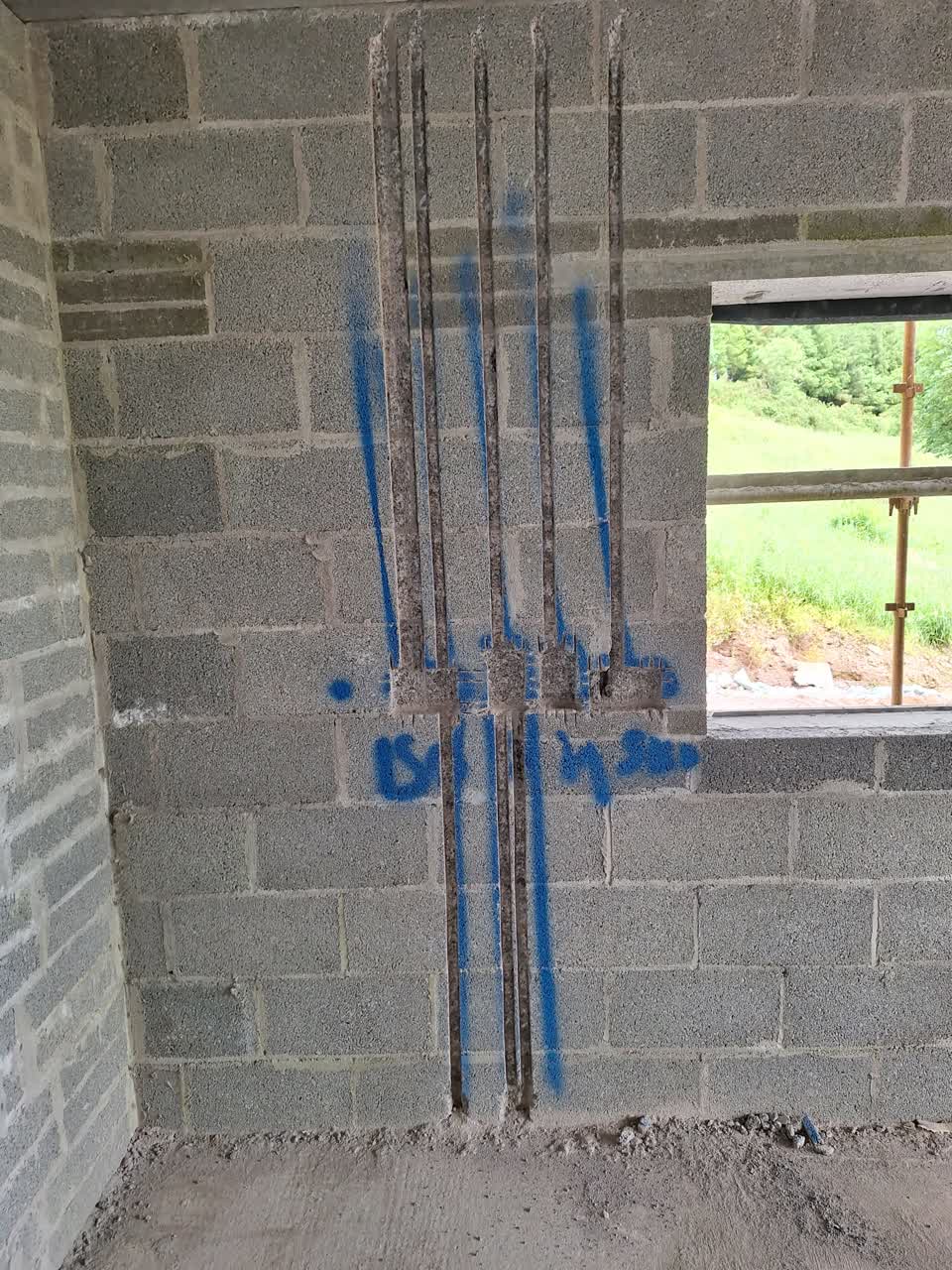 Clean wall chasing channels cut through blockwork for electrical conduit